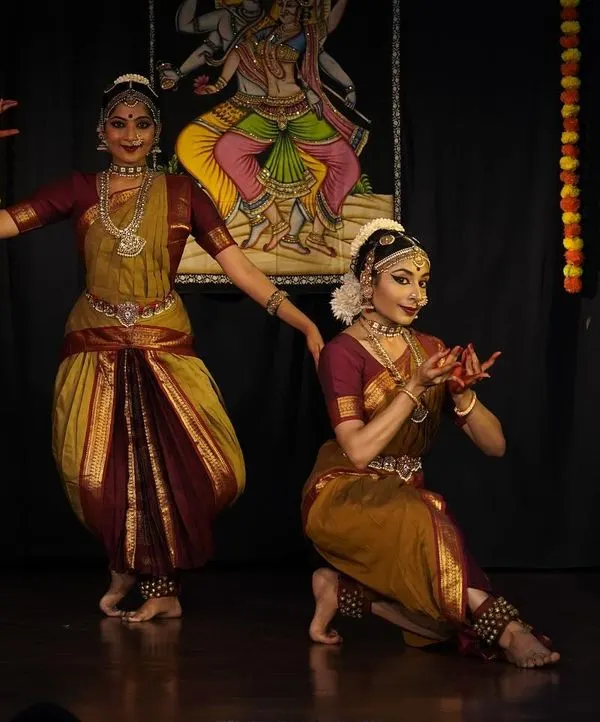 A moment of perfect synchronicity during a duet performance for World Dance Day. Dancing with a partner brings a unique dynamic of contrast and connection to the stage.