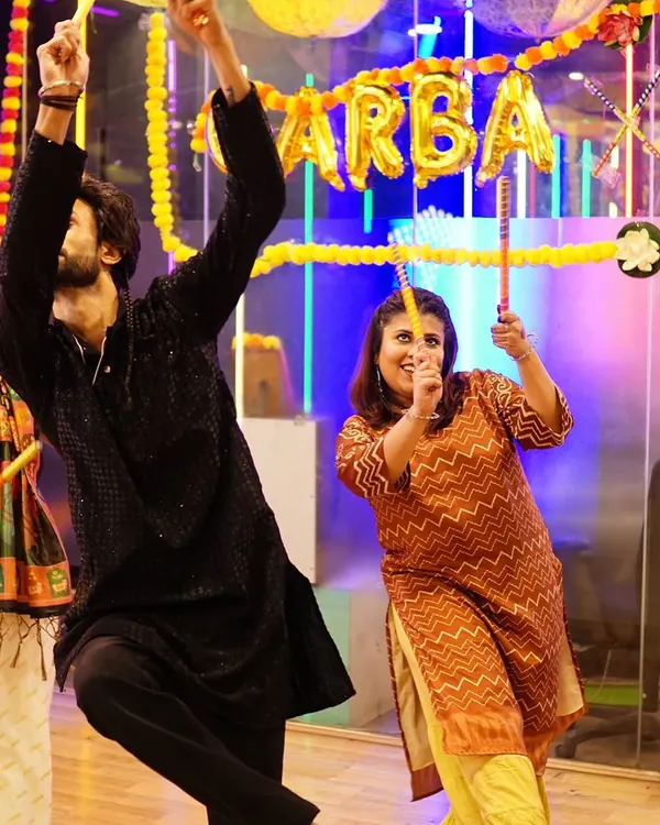 An action shot of our instructor and a student lost in the rhythm during our Garba workshop. The energy on the dance floor is always electric.