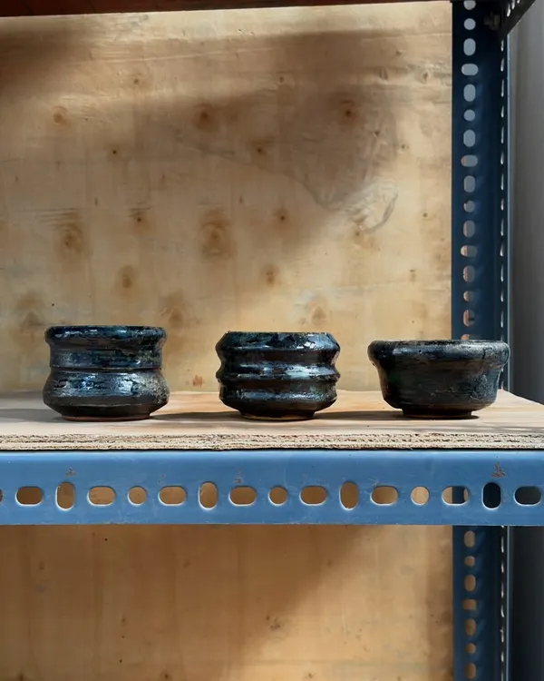 A set of three multi-purpose bowls, perfect for tea, snacks, or dips. Each bowl shows unique characteristics from being gas-fired and then re-fired in a wood kiln, creating beautiful, layered glazes.