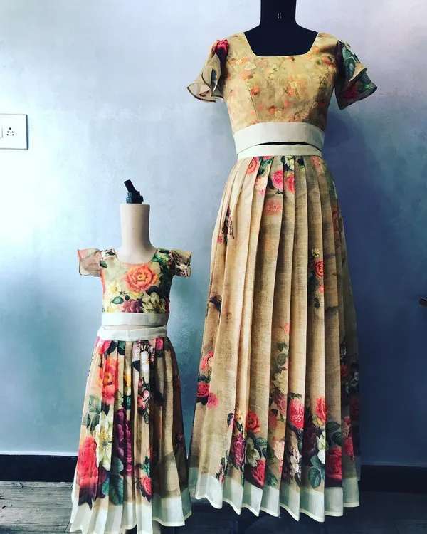 A beautiful floral saree repurposed into a matching mother-daughter lehenga set. I ensure both outfits are comfortable and perfectly tailored for you and your little one.