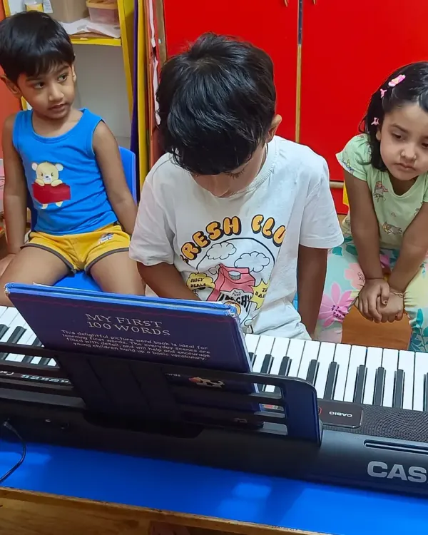 Day 1 of our Music Summer Camp at Podar Prep Pre School in Malad West. Our students are eager to start their musical journey, gathered around the Casio keyboard.
