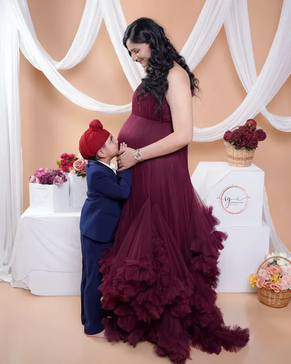This is what it's all about: family, love, and the sweet anticipation of a new arrival. Capturing the bond between a mother and her child before the new baby joins them is one of my greatest joys.