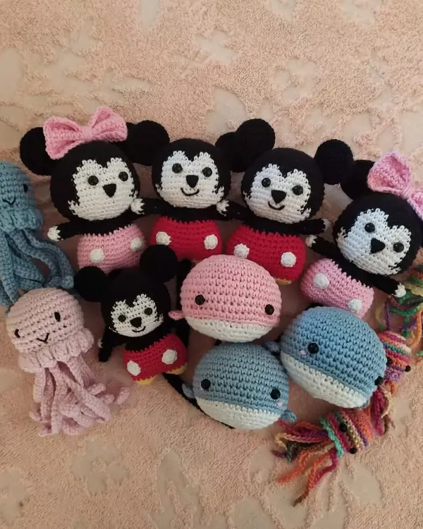 I just love seeing them all together before they head to their new homes. This little gang includes some of my most requested characters like Mickey and Minnie Mouse, some happy little whales, and colorful jellyfish, all handmade as part of a custom bulk order.