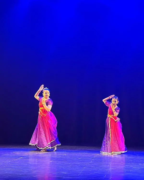 A group of our senior Kathak students performing a complex piece at our annual show. The vibrant costumes and synchronized movements reflect months of dedicated practice and teamwork.