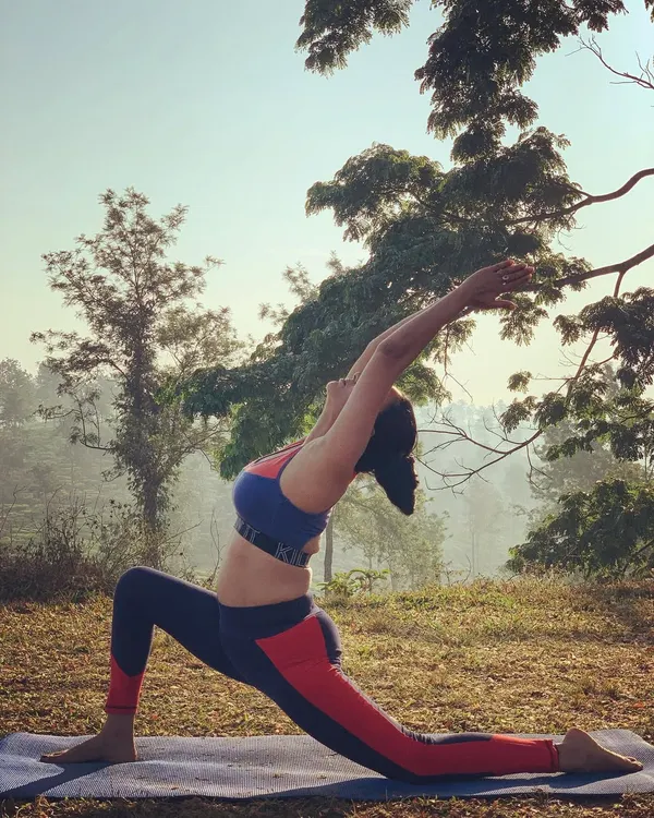 Hip-opening poses like the low lunge, or Anjaneyasana, are so important for women's health. They can help reduce lower back pain, release stored stress, and improve blood flow to the pelvis, which is beneficial for those with PCOD or PCOS.