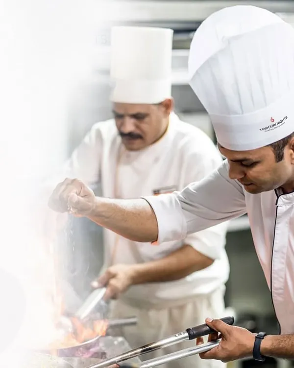 A chef's masterpiece, served with elegance. Our team of chefs works with precision and passion, crafting every dish to perfection.