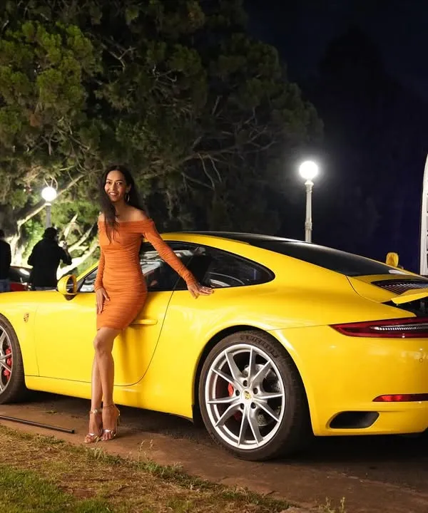 Posing with a beautiful Porsche at a luxury car launch I hosted in Ooty. I specialize in creating a high-end, glamorous atmosphere for premium brand events, ensuring your product gets the spotlight it deserves.