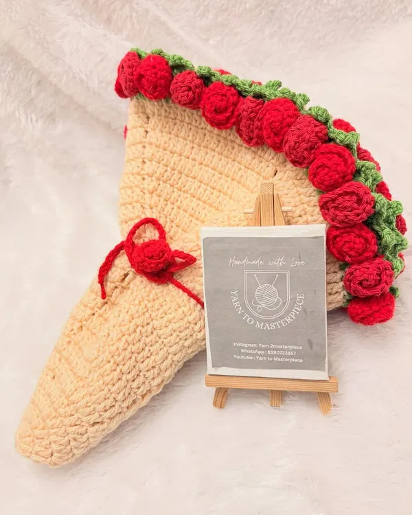 This is my viral rose blanket, designed to fold up into a beautiful rose bouquet. It's a unique and functional piece of decor that adds a touch of elegance to any room.