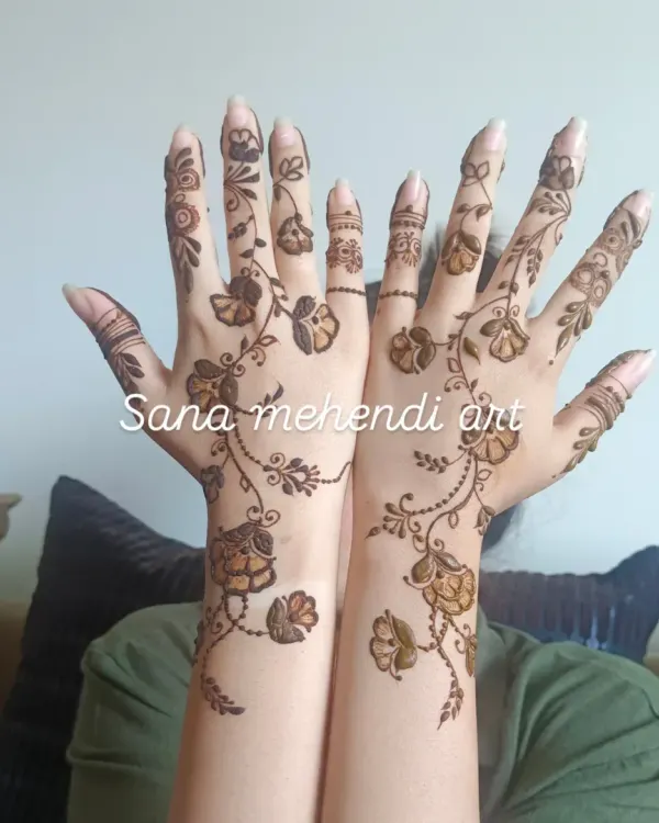 A beautiful floral vine design that gracefully flows from the forearm down to the fingers. This Arabic-inspired style is elegant and leaves some skin showing for a modern look.