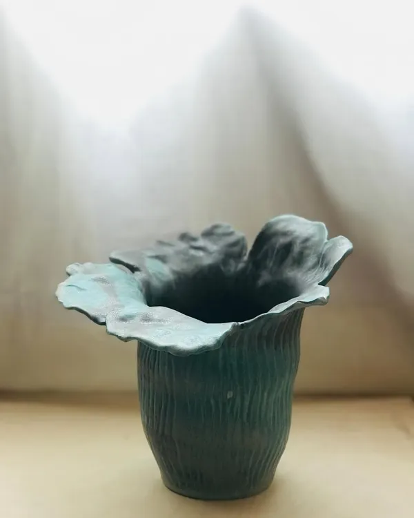 The Wild Petal Vase, a bloom frozen in clay. Each one is hand-built with love and irregularity, because beauty rarely blooms in straight lines.