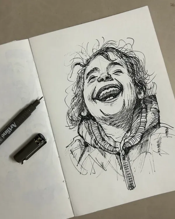 I love capturing pure joy. This pen sketch of a laughing child is one of my favorites. It's all about the expression.