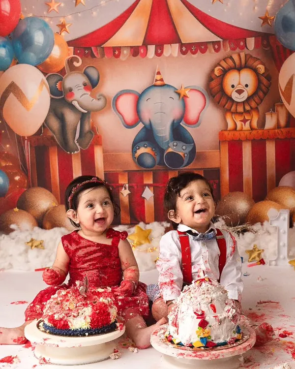 Double the fun and double the smiles! These adorable twins had the best time at their circus-themed first birthday cake smash. It was such a joy to capture their happy, messy celebration.