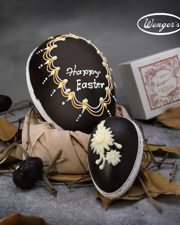 Our classic handmade Easter Egg, crafted from rich dark chocolate and intricately decorated with royal icing. It is the centerpiece of our Easter collection, a tradition loved by generations.