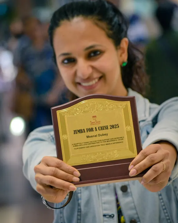 Holding this plaque from a "Zumba for a Cause" event feels like holding love. We did this fundraising event for underprivileged children, and I'm so grateful for everyone who contributed.