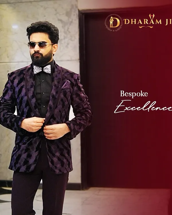 This is the kind of bespoke excellence I strive for. A custom-designed tuxedo jacket in a striking purple and black velvet pattern, paired with a black shirt and a sparkling bow tie. It's a perfect look for a cocktail night or reception, designed to make a statement.