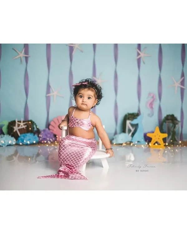 Shell we admire this cuteness? This little mermaid is ready for her underwater adventure in this creative sitter session.