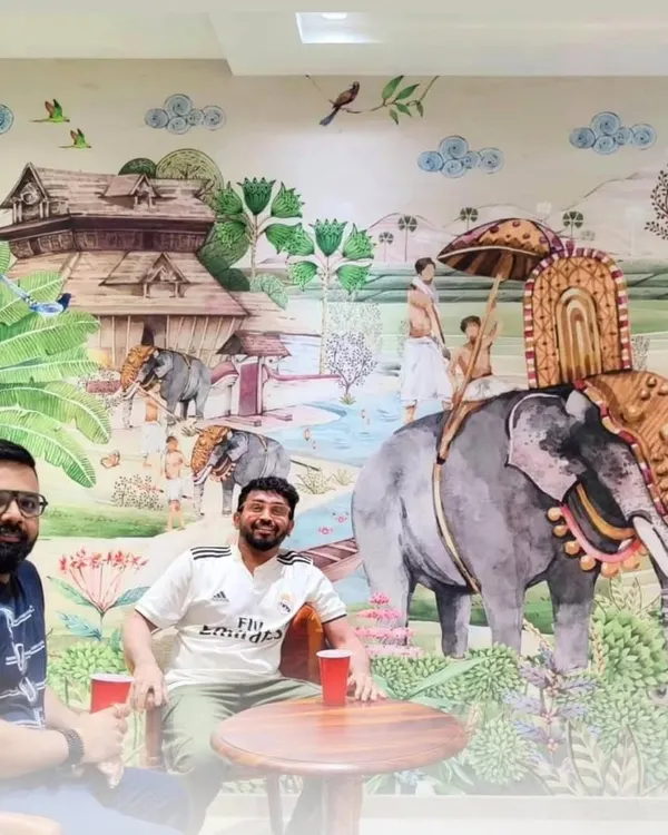 This custom mural depicting a traditional Indian scene provides a rich, cultural backdrop for a seating area. It’s a great example of how I can create a unique and immersive atmosphere for restaurants or themed cafes.