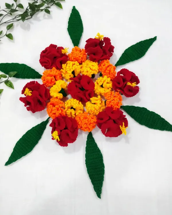 Just a quick, beautiful arrangement of my handmade crochet flowers and leaves. These can be used to create a permanent, reusable floral rangoli or other decorations.