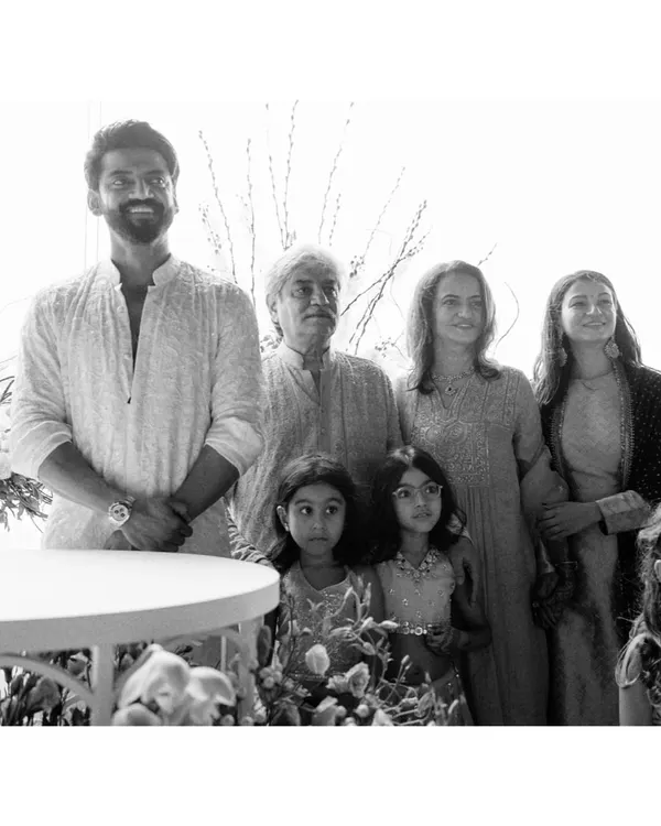 A beautiful family portrait of Zaheer with his loved ones. The natural light and relaxed poses create a warm and authentic image of family connection on this special day.