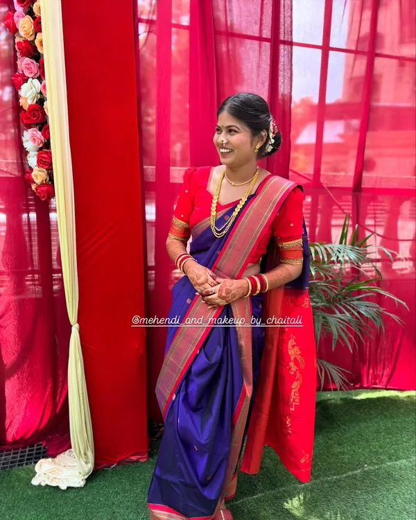 A full view of a perfectly draped Nauvari saree. I ensure the pleats are neat and the fit is comfortable, allowing you to move with ease during any event.