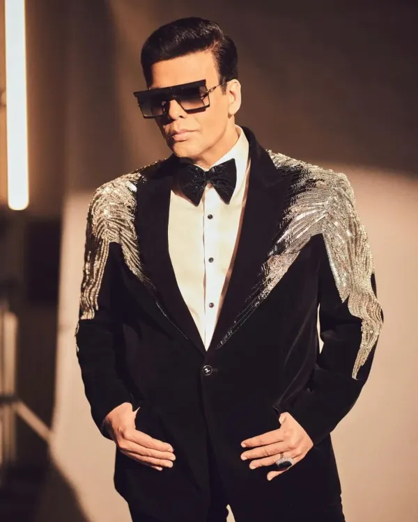 A closer look at the black velvet tuxedo I created for Karan Johar. The hand-strung silver beaded tassels on the shoulders are designed to catch the light and create a sense of movement and drama.