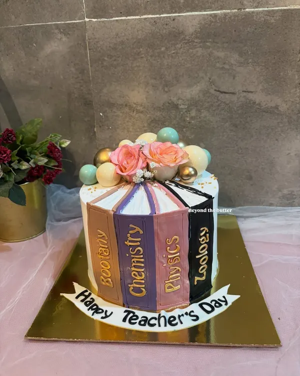 This was a dream theme for me. A cake designed as a stack of books for a teacher, with subjects like Botany, Chemistry, and Physics on the spines. I was so happy with how this turned out.