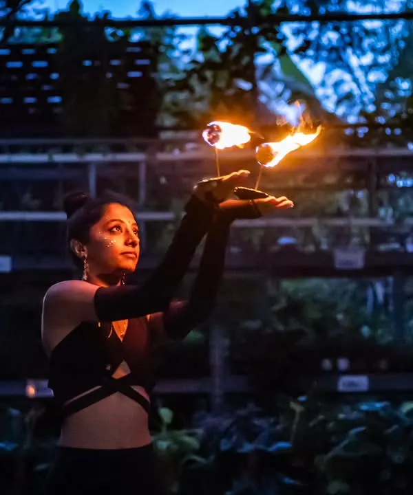 Holding fire lamps during a performance. There's a deep sense of focus and respect you have to have when working with fire. It’s a practice that has taught me so much about courage.