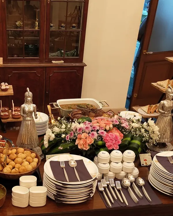 A beautiful high-tea spread I created for a client. The table is laden with a mix of Indian and continental treats, from Kothimbir Vadi and Mattra Kulcha to Cucumber Sandwiches and Chocolate Blueberry Tarts.