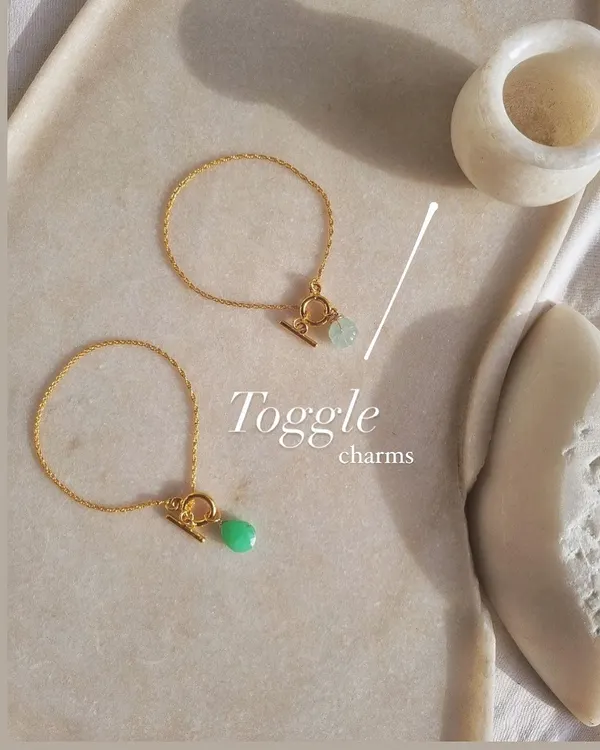 These are my 'Melon' toggle bracelets. The Aquamarine version brings calming vibes, while the Chrysoprase one promotes love of truth and helps mend a broken heart.