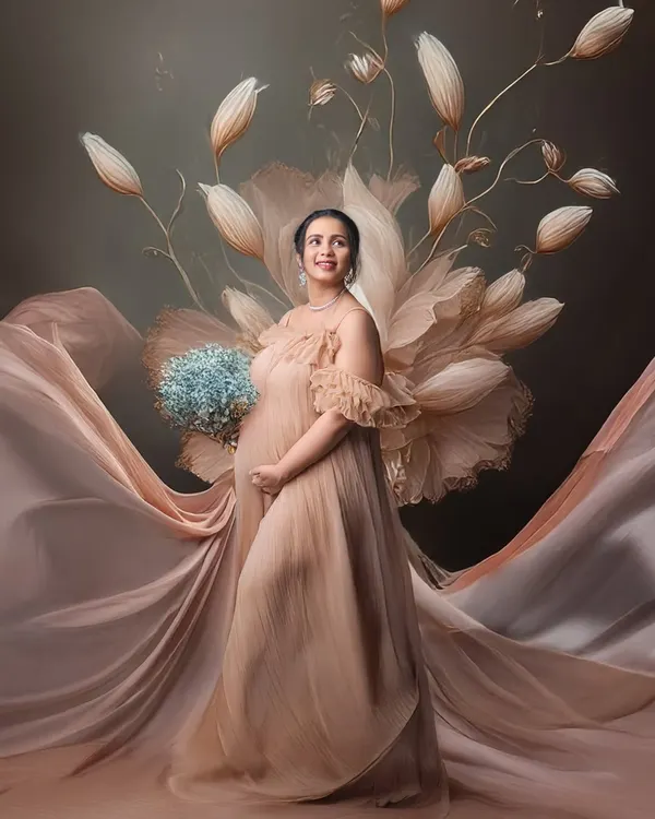An example of our creative editing services. We combined a studio portrait with digital elements to create this stunning, artistic image with a large, ethereal flower.