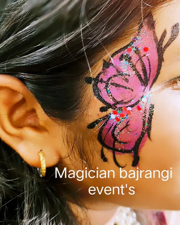 A close up of a beautiful butterfly face painting. I use high quality, skin friendly paints and add a touch of glitter to make the designs extra special.