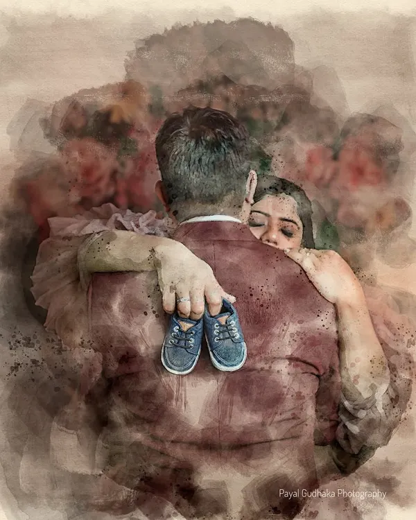 A photograph transformed into a beautiful watercolour painting. This artistic edit adds a soft, dreamy, and timeless quality to an already emotional moment of a couple's embrace.