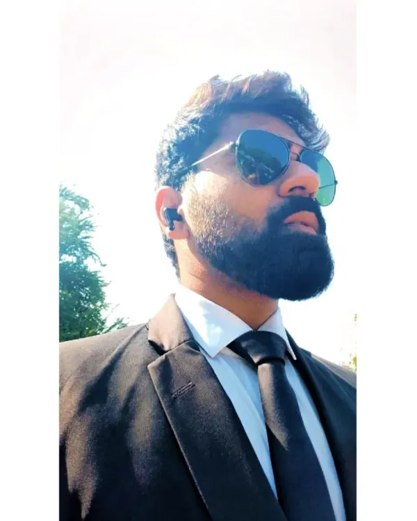 Dressed for battle, always. A sharp suit is my armor, and confidence is my weapon.