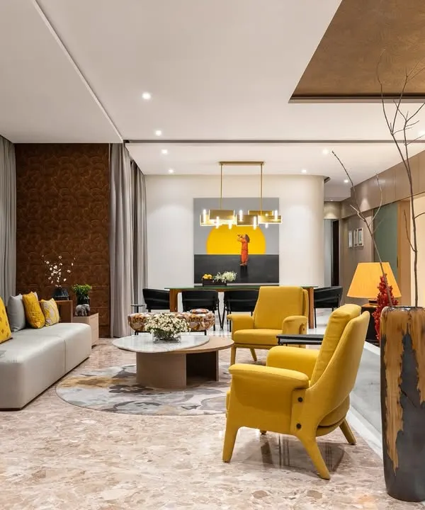 This is where life unfolds. In this expansive 6800 sq. ft. Mumbai apartment, I balanced grandeur with intimacy. The bold use of yellow against a sophisticated grey palette creates a living space that is both energetic and elegant, proving that even the largest rooms can feel like home.