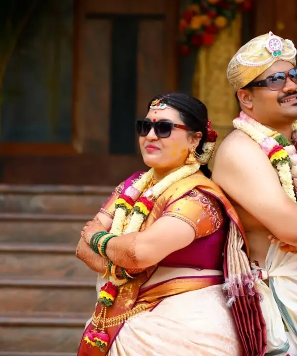 A fun, modern twist on a traditional wedding portrait. We encourage couples to be themselves, and we're always ready to capture those playful, candid moments.
