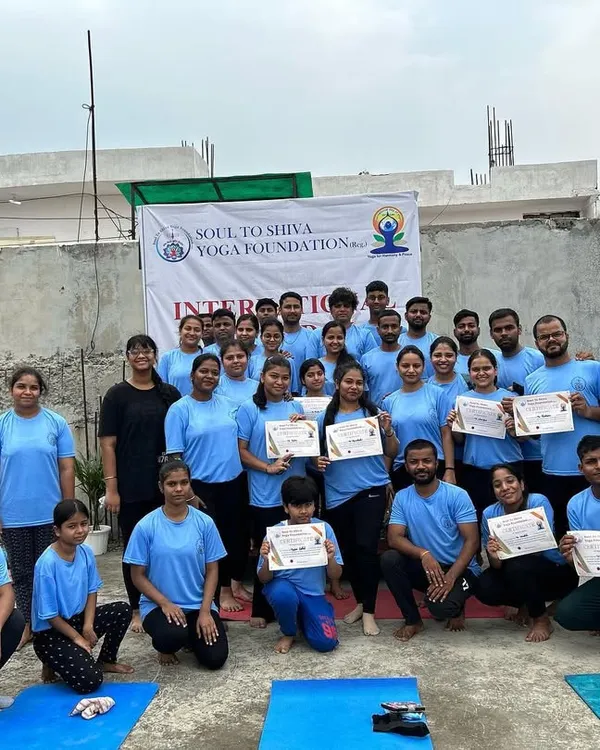 Our community celebrating their achievements on International Yoga Day. It is a joy to see students of all ages and backgrounds come together, holding their certificates of participation after a fulfilling rooftop session.