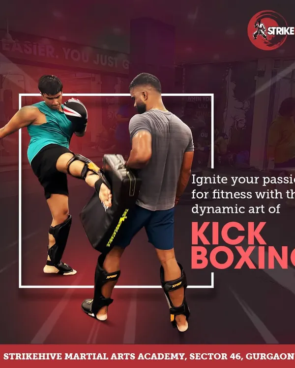 Ignite your passion for fitness with the dynamic art of kickboxing. This image captures a student practicing a powerful knee strike on the pads, a key technique in our Muay Thai training.