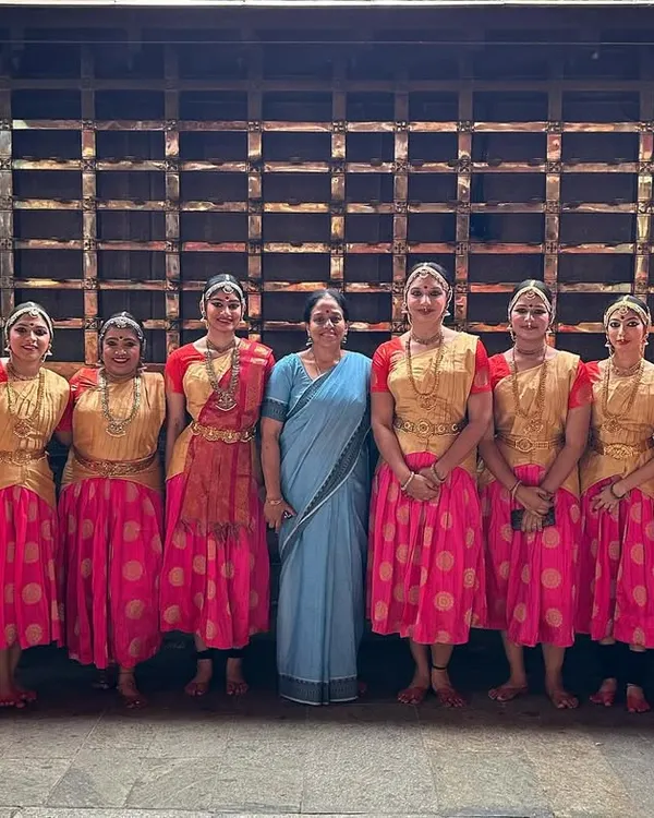 With my Guru, Smt. Revathi Srinivasraghavan, and my fellow dancers during a dance tour. Being part of an ensemble is about creating a cohesive visual story, and the bonds we share offstage make our performances even more special.