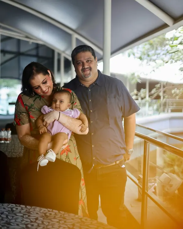 A candid moment of a new family. I love capturing these simple, happy portraits of parents with their baby.