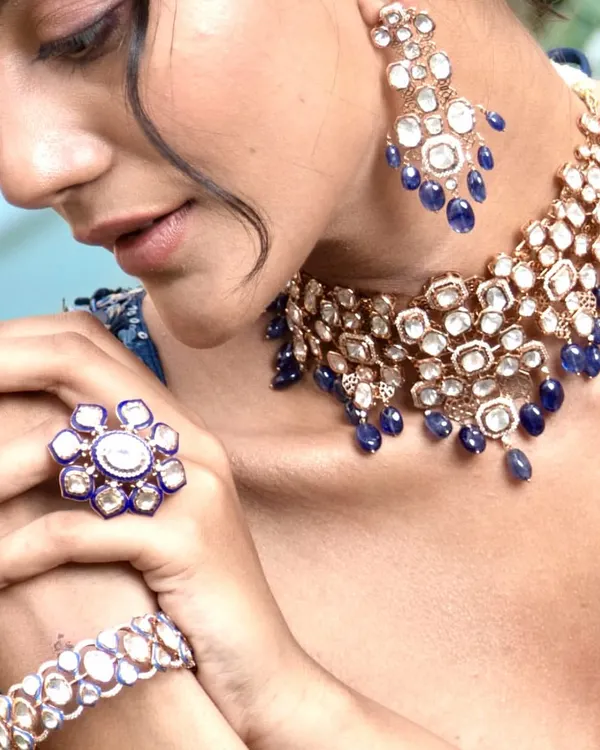 A close-up of a stunning polki and blue sapphire choker set I styled for Om Jewellers. The focus here is on the craftsmanship and the beautiful contrast of colors, perfect for a modern Indian bridal trousseau.