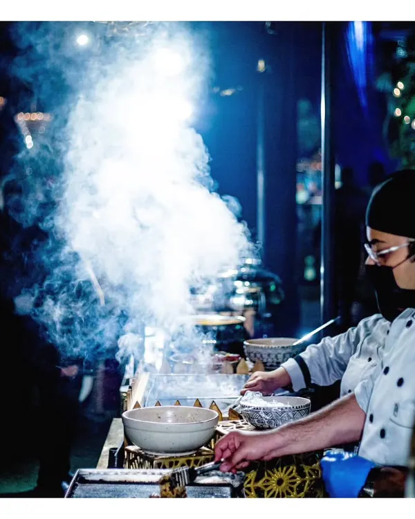 The dramatic plume of smoke from a sizzling tawa station creates an exciting and aromatic focal point at any event. Our chefs engage with guests as they prepare flavourful dishes live, adding a dynamic element to the culinary experience.