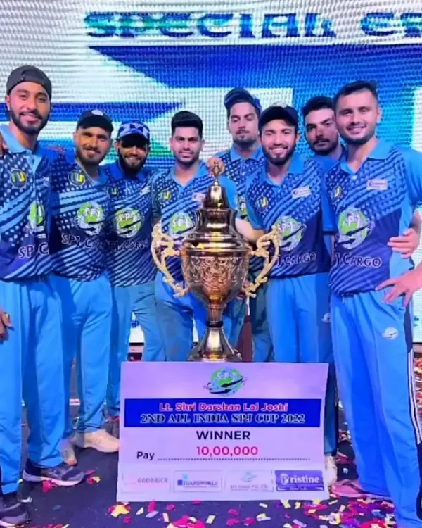 Celebrating a massive win at the 2nd All India SPJ Cup. Our players holding the trophy and a winner's cheque for 10,00,000 rupees after a nail-biting final.
