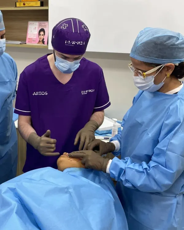 Here you can see our team collaborating during a procedure. Continuous learning and teamwork are central to our practice, ensuring we provide the highest standard of care.