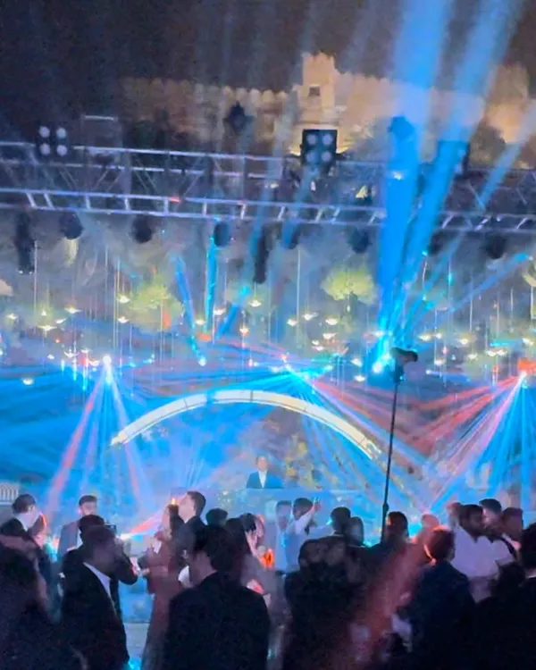 The fort walls have witnessed centuries, but tonight they swayed to my music. The red and blue laser show created a stunning contrast against the historic stone.