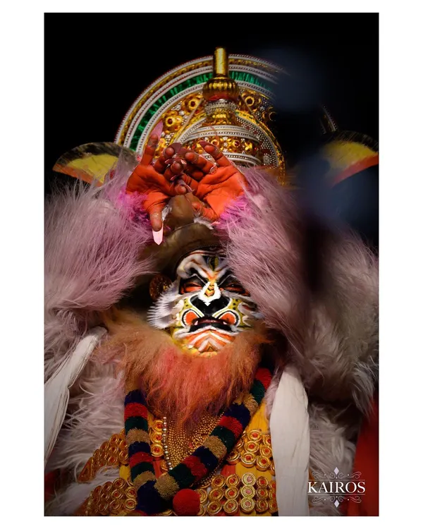 A dramatic and powerful portrayal of the Hindu deity Narasimha from a Kathakali performance. The intense colors, detailed makeup, and fierce expression tell a story of divine justice.