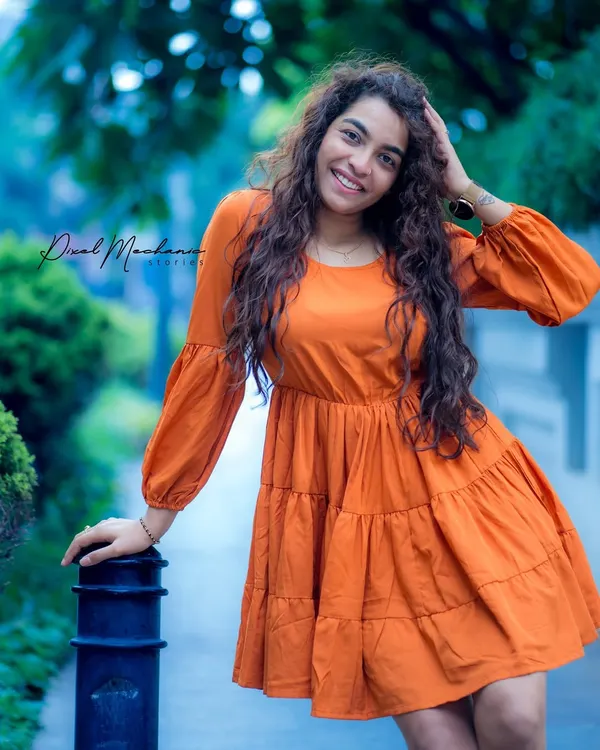 Even on a grey day, a pop of color can make the city your own. We used this quiet Bengaluru street to create a cheerful, candid portrait that feels full of life.