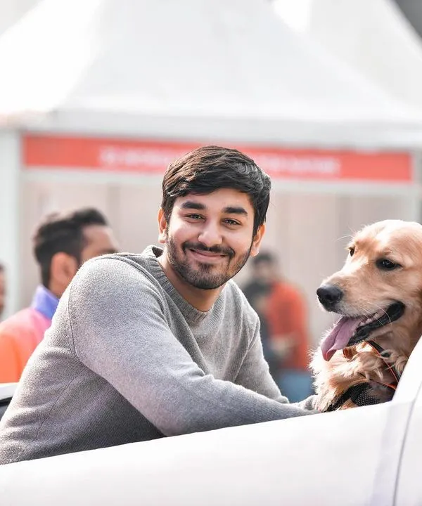 A smile from him and a happy pant from his best friend. This is the kind of relaxed, happy moment I love to capture. It’s a simple portrait of two friends enjoying a day out together.