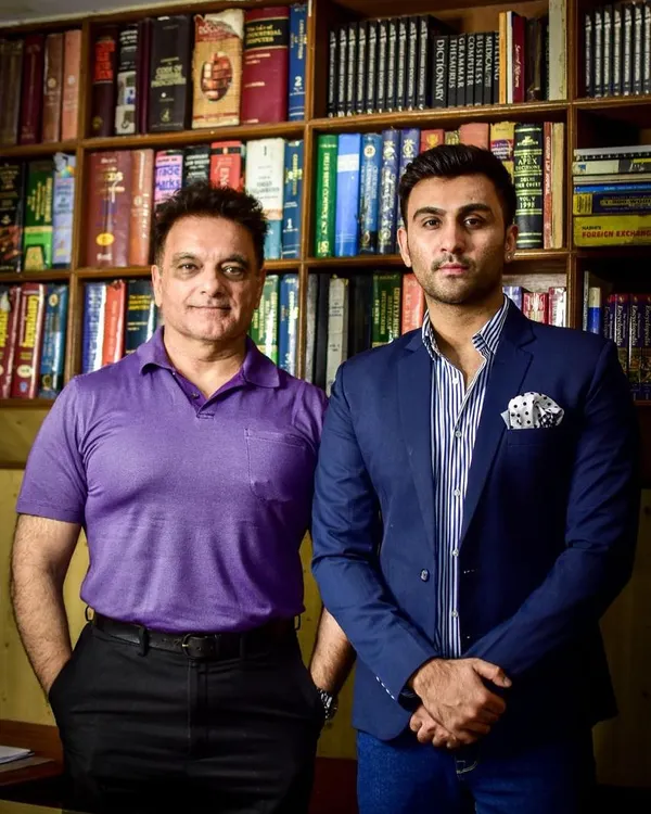 My son, Sameer, and I at our firm, Sanjay Kalra and Associates. We combine our strengths to offer comprehensive immigration law services, helping clients navigate the path to the US.
