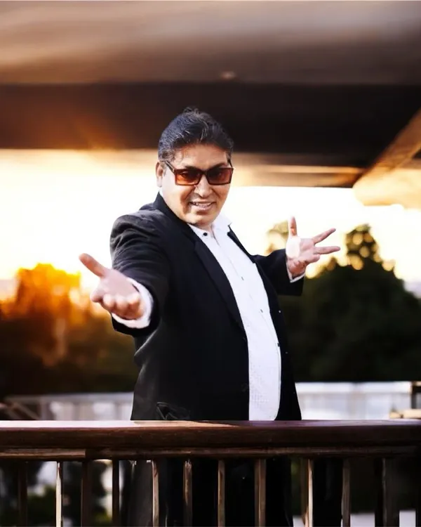 A professional portrait of me, ready to bring magic and entertainment to your event. I believe in presenting myself with the same level of quality and showmanship that I bring to my performances.