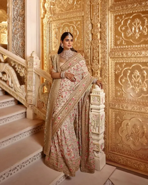 For a major wedding event, we styled Isha Ambani Piramal in this magnificent Manish Malhotra saree. The intricate floral embroidery and regal drape against the palatial backdrop made for a truly timeless look in Indian couture.